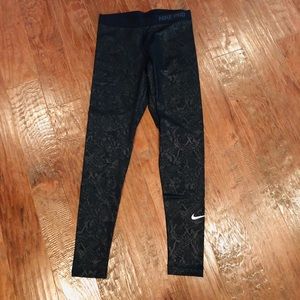 Nike Dri-Fit black leggings snakeprint pattern